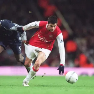 Cesc Fabregas (Arsenal) Abdoulaye Meite (Bolton) Cesc Fabregas (Arsenal) Abdoulaye Meite (Bolton)