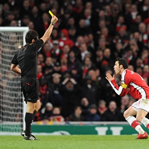 Cesc Fabregas (Arsenal) is booked by referee Massimo Busacca. Arsenal 2: 2 Barcelona