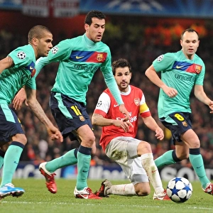 Cesc Fabregas (Arsenal) Daniel Alves, Sergio Busquets and Andres Iniesta (Barcelona)