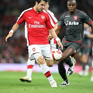 Cesc Fabregas (Arsenal) Edson Braafheid (Twente)