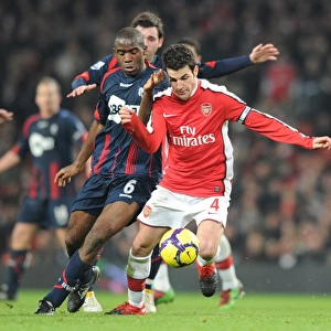 Cesc Fabregas (Arsenal) Fabrice Muamba (Bolton). Arsenal 4: 2 Bolton Wanderers
