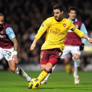 Cesc Fabregas (Arsenal) Julien Faubert (West Ham). West Ham United 0: 3 Arsenal