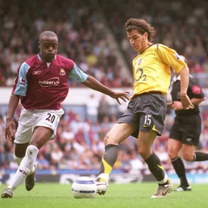 Cesc Fabregas (Arsenal) Nigel Reo-Coker (West Ham). West Ham United 0: 0 Arsenal