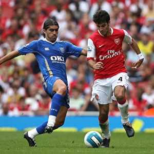 Cesc Fabregas (Arsenal) Pedro Mendes (Portsmouth) for Arsenals penalty