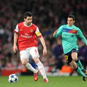 Cesc Fabregas (Arsenal) Pedro Rodriguez and Gerard Pique (Barcelona). Arsenal 2