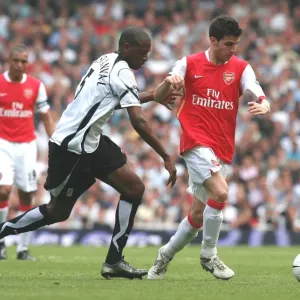 Cesc Fabregas (Arsenal) Philippe Christanval (Fulham) Cesc Fabregas (Arsenal) Philippe Christanval (Fulham)