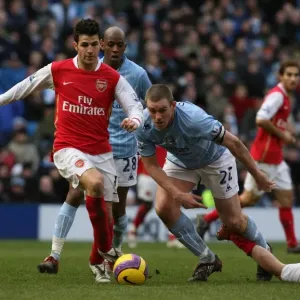 Cesc Fabregas (Arsenal) Richard Dunn (Manchester City)