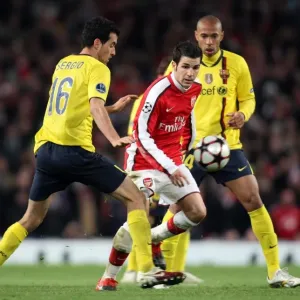 Cesc Fabregas (Arsenal) Sergio Busquets and Thierry Henry (Barcelona). Arsenal 2