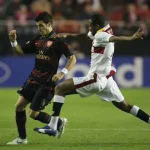 Cesc Fabregas (Arsenal) Seydou Keita (Seville) Cesc Fabregas (Arsenal) Seydou Keita (Seville)