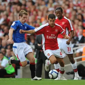 Cesc Fabregas (Arsenal) Steven Davis (Rangers) Cesc Fabregas (Arsenal) Steven Davis (Rangers)
