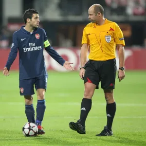 Cesc Fabregas (Arsenal) talks with referee during the match Cesc Fabregas (Arsenal) talks with referee during the match