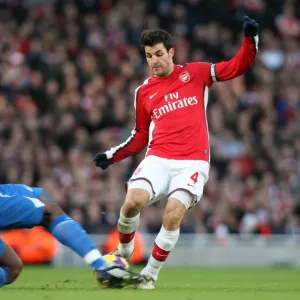 Cesc Fabregas (Arsenal) Titus Bramble (Wigan) Cesc Fabregas (Arsenal) Titus Bramble (Wigan)