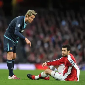 Cesc Fabregas (Arsenal) Valon Behrami (West Ham). Arsenal 2: 0 West Ham United