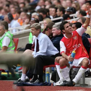 Cesc Fabregas (Arsenal) waves at the fans after being substituted