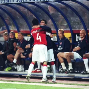 Cesc Fabregas celebrates scoring the 1st Arsenal goal with Jose Reyas Cesc Fabregas celebrates scoring the 1st Arsenal goal with Jose Reyas
