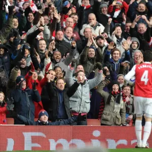 Cesc Fabregas celebrates scoring the 2nd Arsenal goal the the fans. Arsenal 2 Cesc Fabregas celebrates scoring the 2nd Arsenal goal the the fans. Arsenal 2