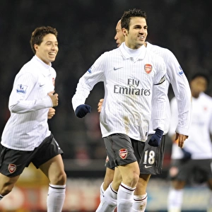 Cesc Fabregas celebrates scoring the Arsenal goal with Samir Nasri and Mikael Silvestre