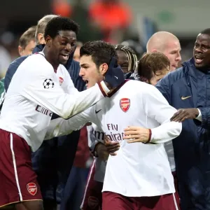 Cesc Fabregas celebrates scoring Arsenals 1st goal with Emmanuel Adebayor