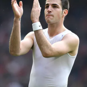 Cesc Fabregas claps the Arsenal fans after the match