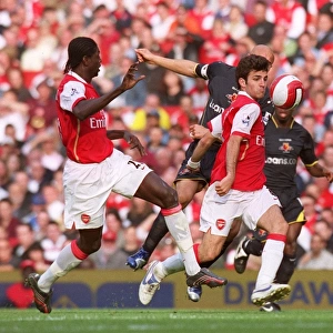 Cesc Fabregas and Emmanuel Adebayor (Arsenal) Gavin Mahon (Watford)