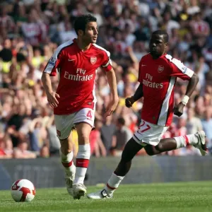 Cesc Fabregas and Emmanuel Eboue (Arsenal) Cesc Fabregas and Emmanuel Eboue (Arsenal)
