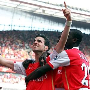 Cesc Fabregas and Emmanuel Eboue: Arsenal's Unstoppable Duo Celebrate Goal Against Bolton Wanderers