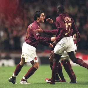 Cesc Fabregas and Emmanuel Eboue Celebrate Arsenal's First Goal Against Juventus in the UEFA Champions League Quarterfinals, 2006