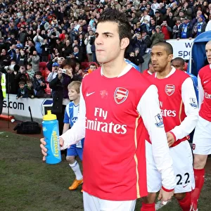 Cesc Fabregas and Gael Clichy (Arsenal) walk out onto the pitch