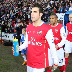 Cesc Fabregas and Gael Clichy (Arsenal) walk out onto the pitch