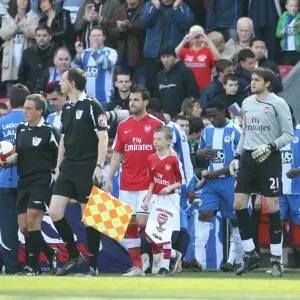 Cesc Fabregas leads the Arenal team out onto the pitch Cesc Fabregas leads the Arenal team out onto the pitch