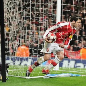 Cesc Fabregas picks up the matchball after scoring the 2nd Arsenal goal Cesc Fabregas picks up the matchball after scoring the 2nd Arsenal goal