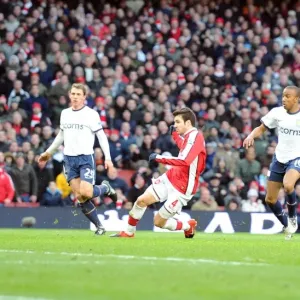 Cesc Fabregas shoots past Aston Villa goalkeeper Brad Friedel to score the 2nd Arsenal goal Cesc Fabregas shoots past Aston Villa goalkeeper Brad Friedel to score the 2nd Arsenal goal