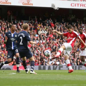 Cesc Fabregas shoots past Blackburn goalkeeper Paul