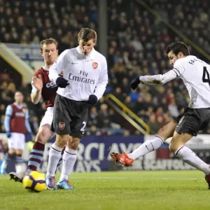 Cesc Fabregas shoots past Burnley goalkeeper Brian Jensen to score the Arsenal goal Cesc Fabregas shoots past Burnley goalkeeper Brian Jensen to score the Arsenal goal