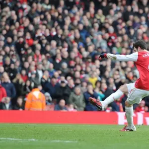 Cesc Fabregas shoots past Huddersfield goalkeeper Ian Bennett from the penalty spot to score the 2nd Arsenal goal. Arsenal 2: 1 Huddersfield Town, FA Cup Fourth Round, Emirates Stadium, Arsenal Football Club, London, 30 / 1 / 2011. Credit : Stuart MacFarl