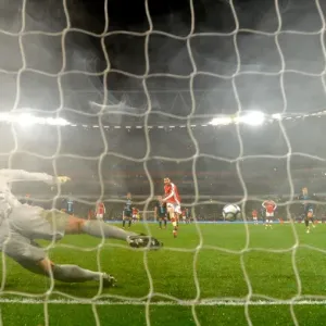 Cesc Fabregas shoots past West Ham goalkeeper Robert Green to score the 2nd Arsenal goal from the penalty spot. Arsenal 2: 0 West Ham United, Barclays Premeir League, Emirates Stadium, Arsenal Football Club, 20 / 3 / 2010. Credit : Stuart MacFarlane