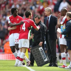 Cesc Fabregas is substituted for Emmanuel Adebayor Cesc Fabregas is substituted for Emmanuel Adebayor