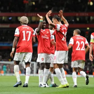 Chamakh and Eboue: Arsenal's Unstoppable Duo Celebrates Fifth Goal vs Shakhtar Donetsk