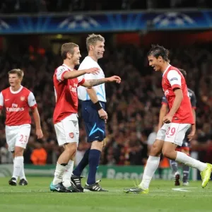 Chamakh and Wilshere: Arsenal's Unstoppable Duo Celebrates 3rd Goal vs. SC Braga in Champions League