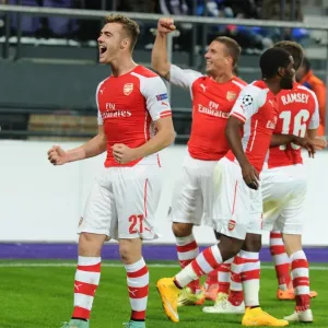 Chambers and Podolski Celebrate Arsenal's Goals in Anderlecht Victory, UEFA Champions League 2014-15
