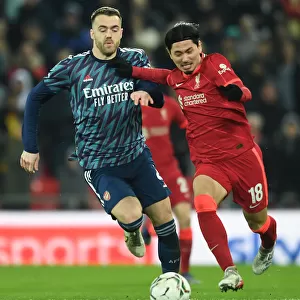 Chambers vs Minamino: Intense Battle in Carabao Cup Semi-Final First Leg between Liverpool and Arsenal