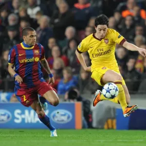 Champions Clash: Nasri vs. Alves in Barcelona's 3:1 UEFA Champions League Victory over Arsenal