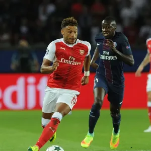 Champions League Showdown: Oxlade-Chamberlain's Determined Performance - Paris Saint-Germain vs. Arsenal