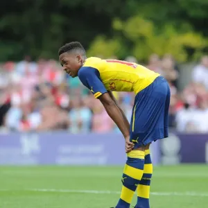 Chris Willock in Action: Arsenal's Pre-Season Friendly against Boreham Wood