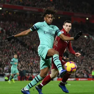 Clash at Anfield: Iwobi vs Robertson in Premier League Showdown