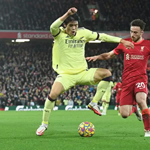 Clash at Anfield: Tomiyasu vs. Jota in the Premier League Showdown between Liverpool and Arsenal