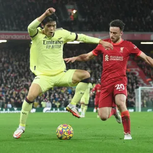 Clash at Anfield: Tomiyasu vs. Jota in the Premier League Showdown between Liverpool and Arsenal