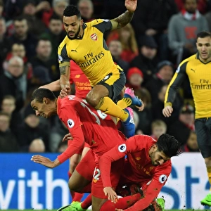 Clash at Anfield: Walcott's Intense Battle Against Matip and Can