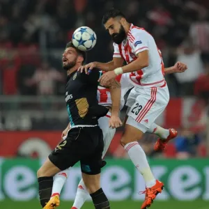 Clash in Athens: Olivier Giroud vs. Dimitris Siovas - Arsenal vs. Olympiacos, UEFA Champions League Clash in Athens: Olivier Giroud vs. Dimitris Siovas - Arsenal vs. Olympiacos, UEFA Champions League