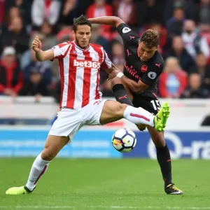 Clash at the Bet365: Oxlade-Chamberlain vs Pieters